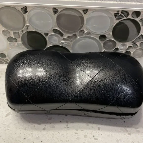 Chanel black leather quilted sunglass case. No sunglasses just the case